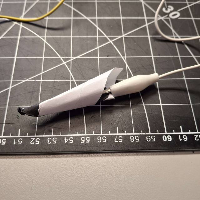 I usually play this game using a stylus, so I tried to recreate one. The inside and the end is painted, and it's connected to the ground clip with the elements it interacts with connect to the other clips