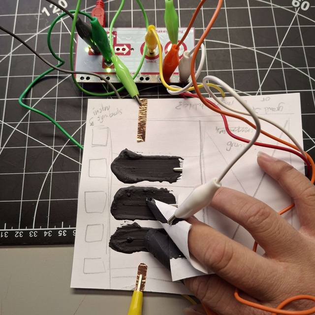Using touch reminded me of the functions of a launchpad for music, so I made a prototype inspired by them. The circuit can only activate when using both styluses, making for an engaged interaction.