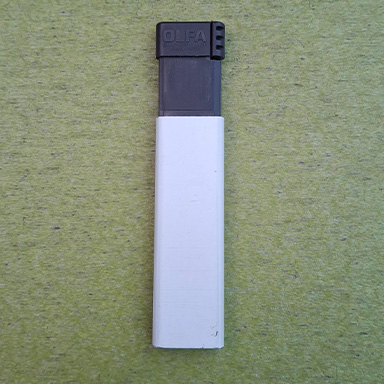 This is a simple box cutter thats quite flat and rectangular. There isn't a lot of small details on this object so it was straightforward to model.