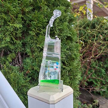 It's shaped like a guitar but doesn't have as much detail which I felt was a good level for me to model it. It can be split into a parts like the main body, the neck, the head of the guitar and the base